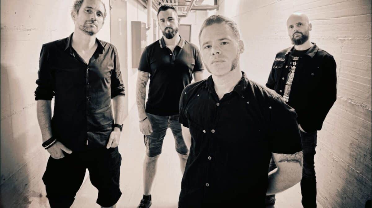 Sybreed band members posing for a promotional photo.