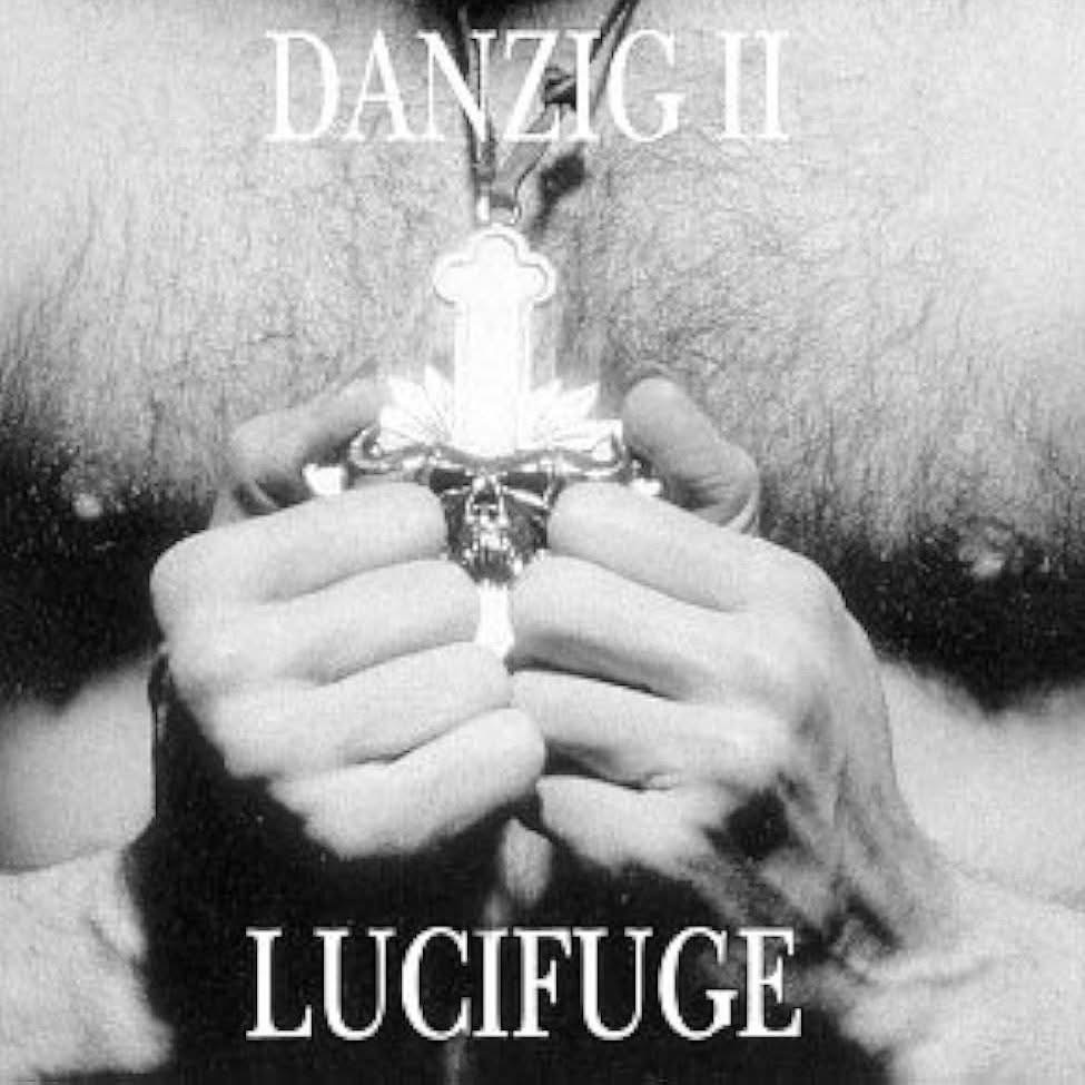 Danzig’s Lucifuge album cover showing hands clutching a cross pendant against a bare chest.