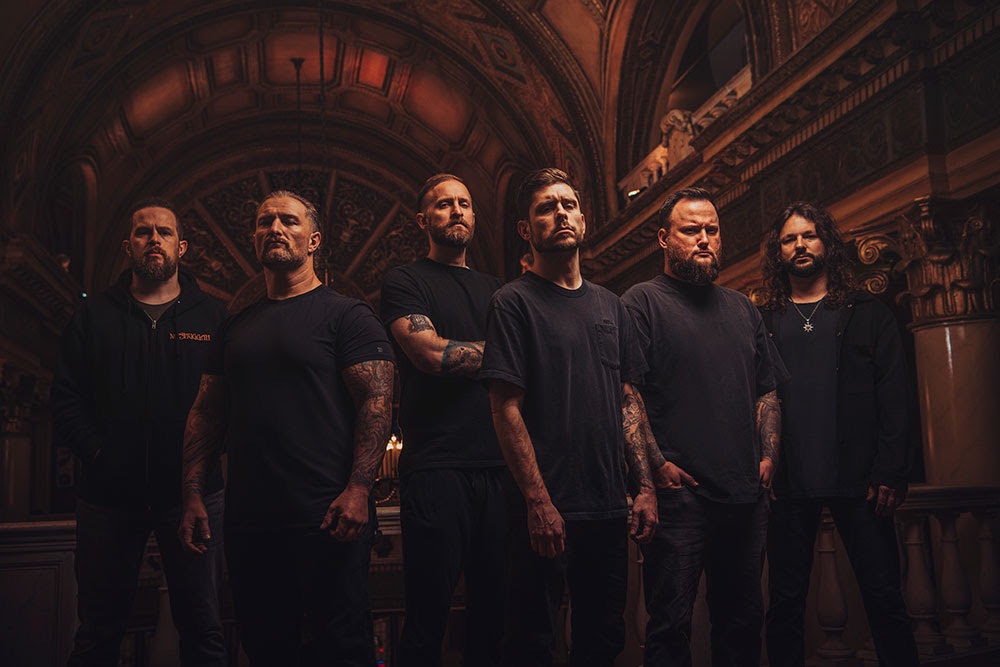 Whitechapel band photo 2025 lineup inside ornate hall – promotional image for Hymns in Dissonance and Rituals of Hate Tour