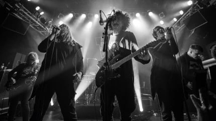 Experimental metal band Zeal & Ardor performing live on stage under dramatic concert lighting for World Metal Weekly