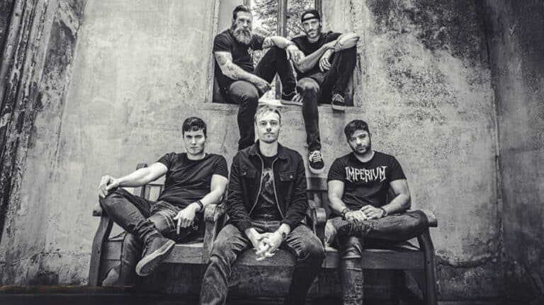 Exodus Unknown by Imperium features the London heavy and thrash metal band posing for a promotional band photo.