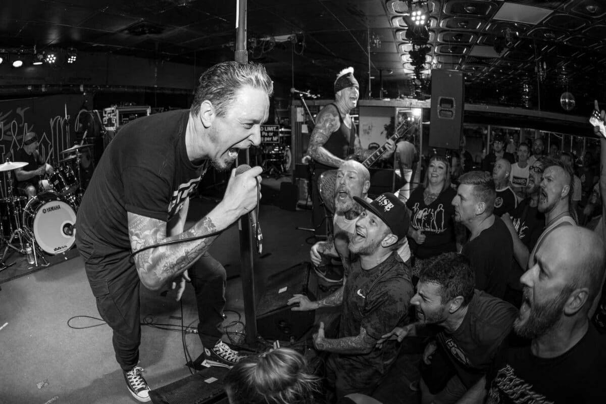 Remembering Lou Koller connecting with fans during an intimate Sick Of It All live performance.
