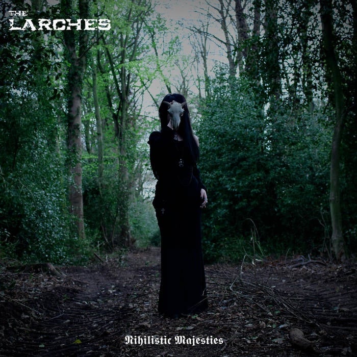 The Larches Nihilistic Majesties EP cover featuring a dark figure holding an animal skull in a shadowy forest.