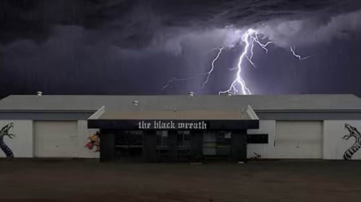 Save The Black Wreath campaign venue in Alice Springs beneath a lightning storm