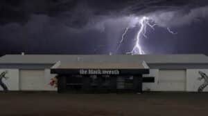 Save The Black Wreath campaign venue in Alice Springs beneath a lightning storm