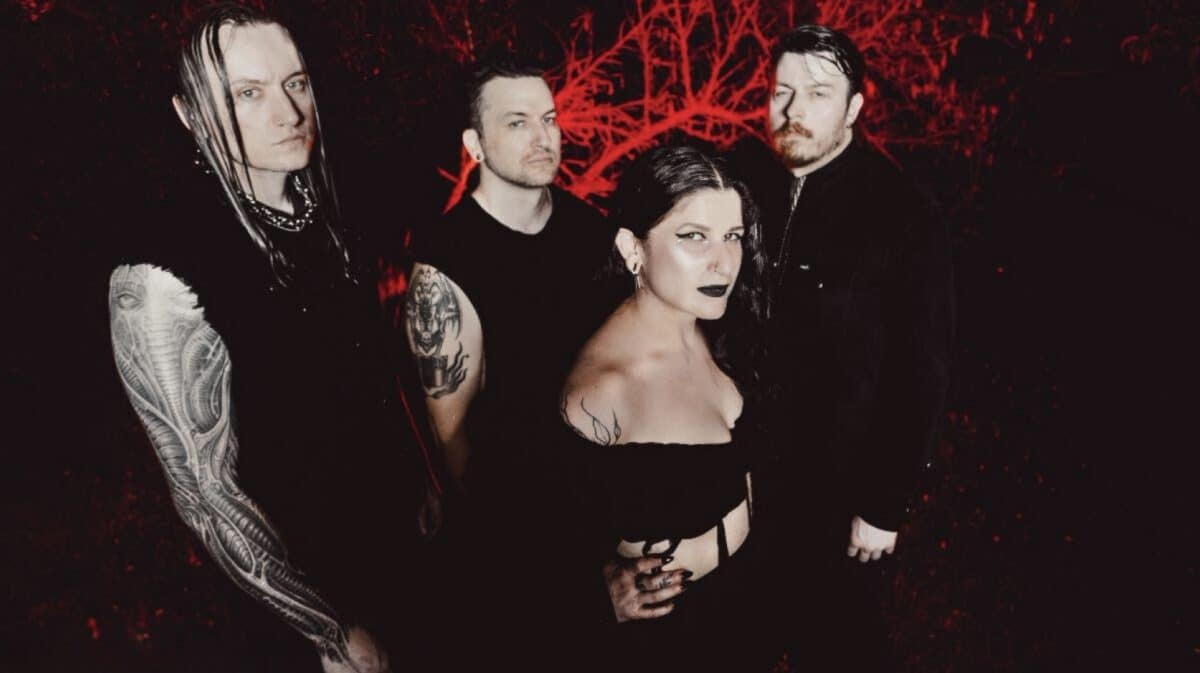 Entheos band promotional photo for Undone and Empty On The Inside featuring four members against a red and black background