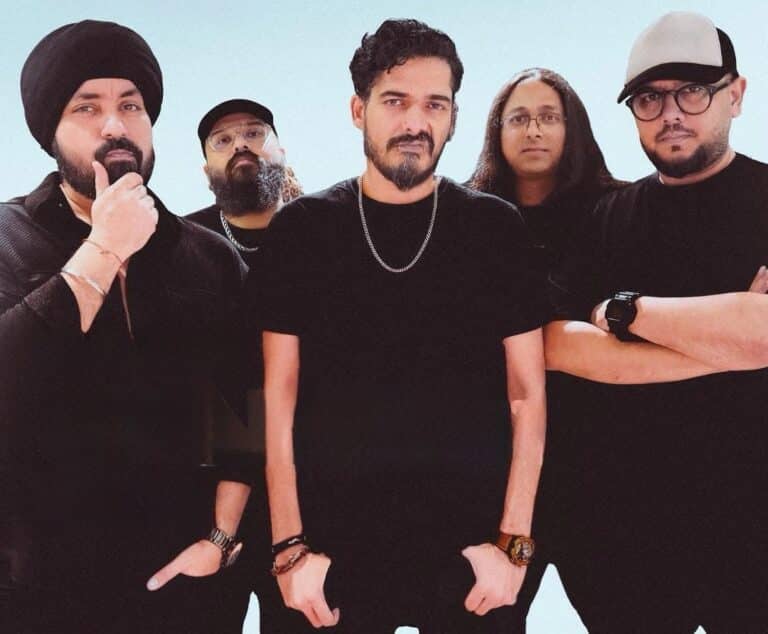 Indian extreme metal band Gutslit posing together in a five-member band portrait