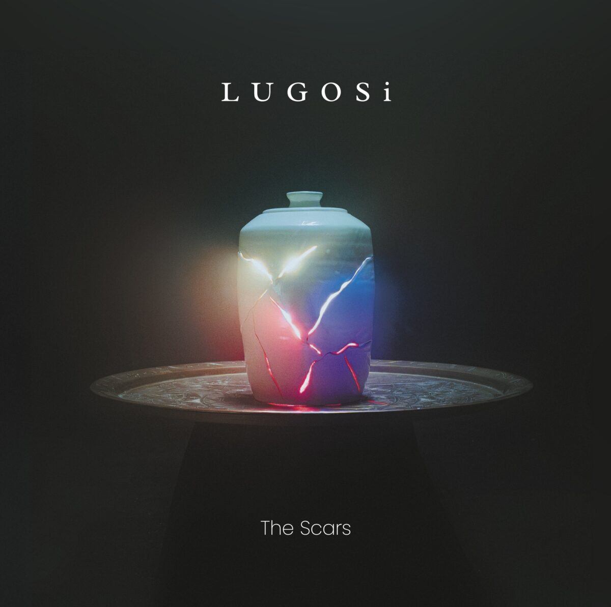 LUGOSi The Scars review album cover featuring a cracked ceramic vessel illuminated by red and blue light