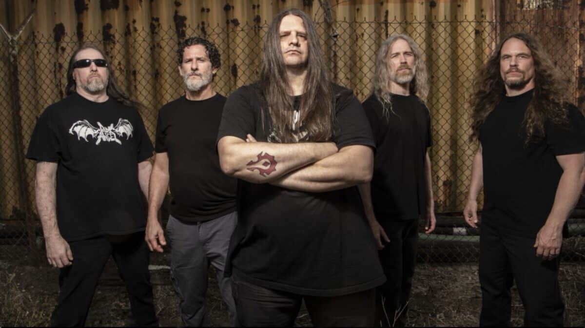 Cannibal Corpse new album update featuring the death metal band in a promotional group photo