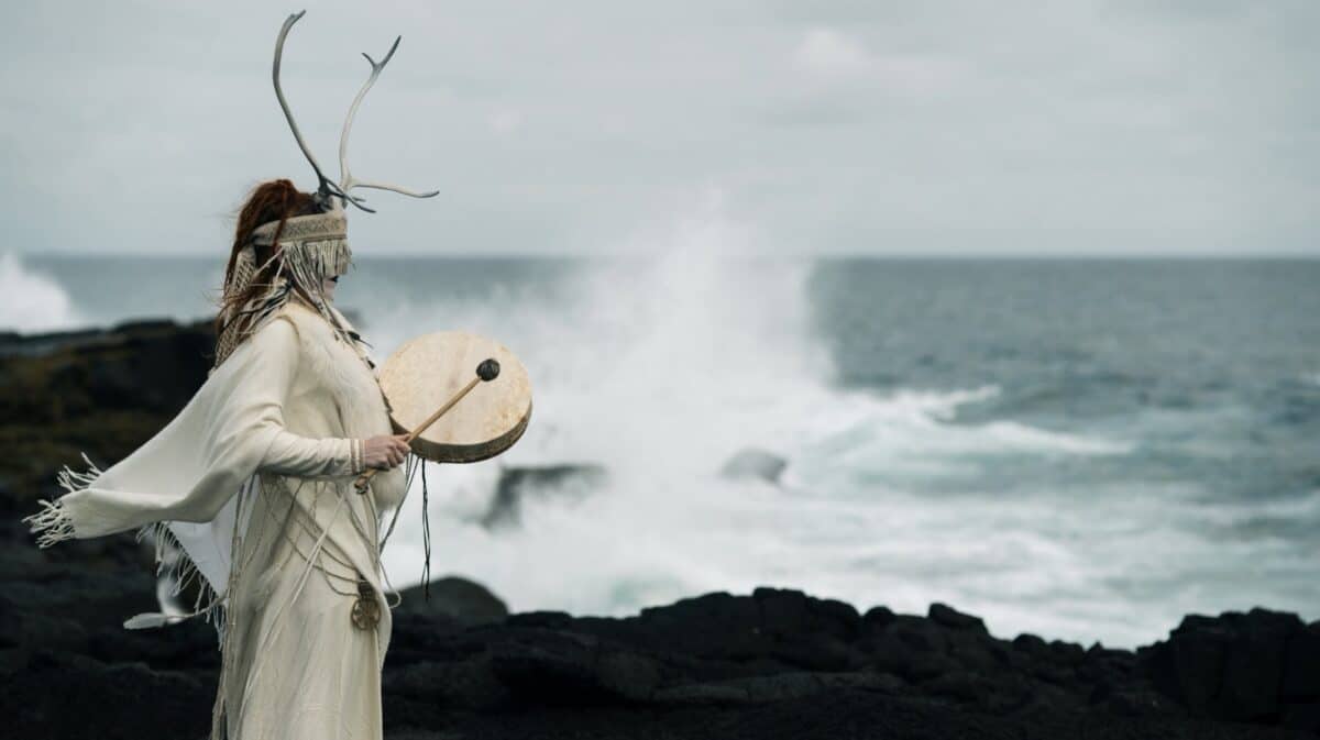 Heilung fourth studio album announcement featuring ritual performer with antlers and frame drum