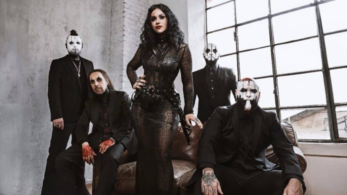 Lacuna Coil Fragile XX – Official band promotional photo featuring Cristina Scabbia and her bandmates dressed in black in an industrial setting.